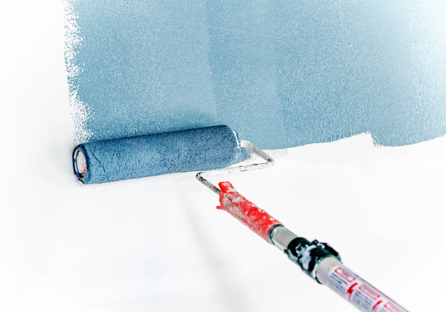Professional painter rolling a wall in a Miami home